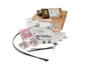 Prusa XL components and parts kit with various packaged items including cables and screws, showcasing the hardware for the 3D printer assembly.