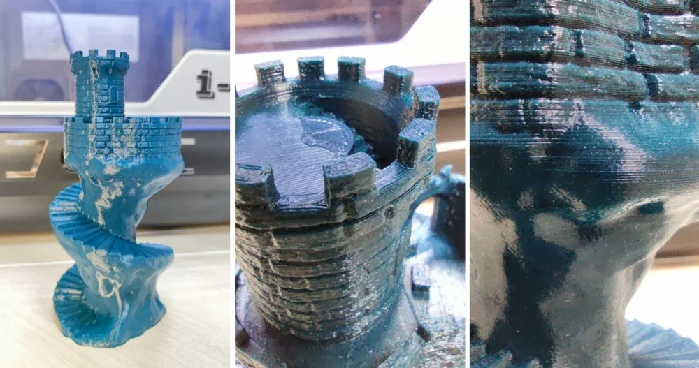 Blue spiral castle tower 3D print by qidi i-fast, showcasing fine details and smooth layers, with the printer visible in the background.