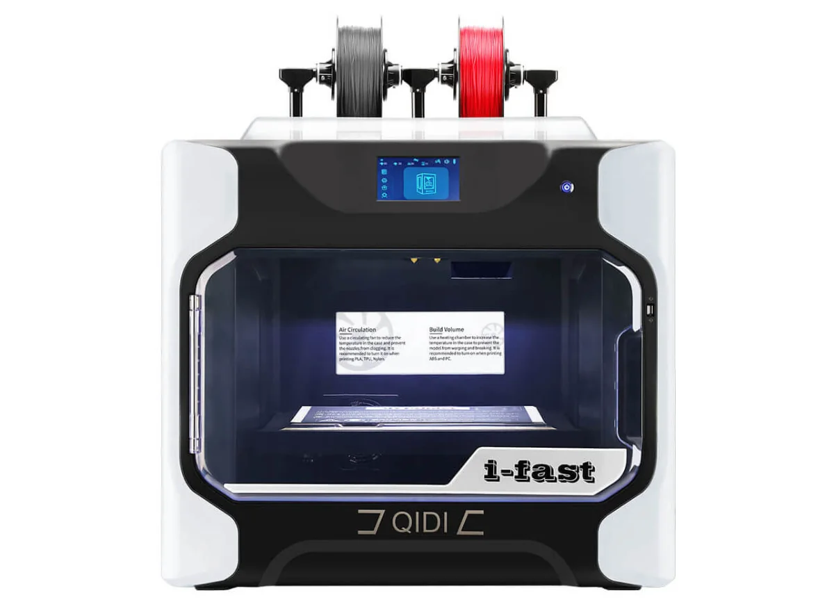 Qidi i-Fast 3D printer with dual filament spools on top in black and white design, featuring touchscreen display and enclosed build chamber.
