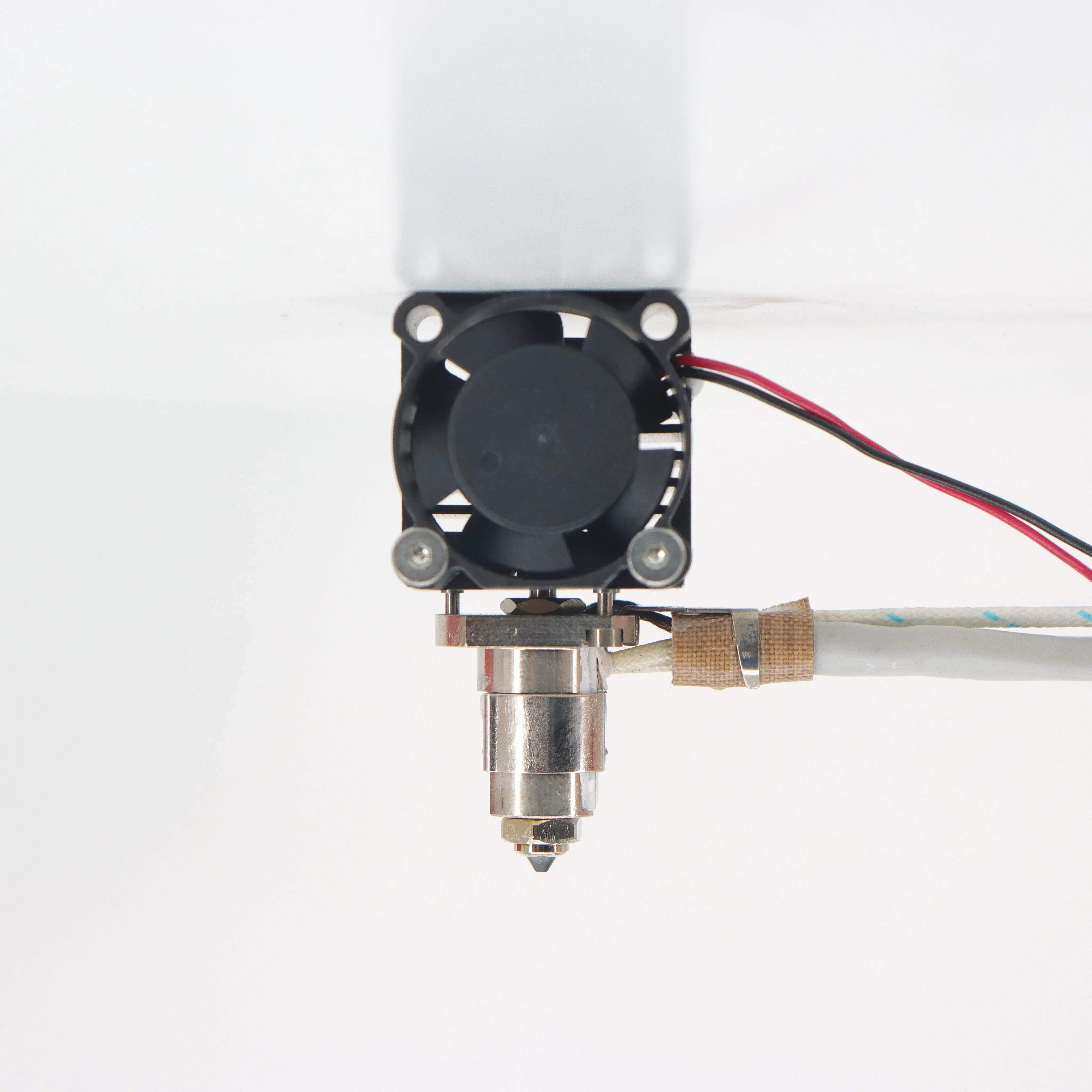 Qidi X Max 3D printer extruder with fan and wiring, shown in detail against a plain background.