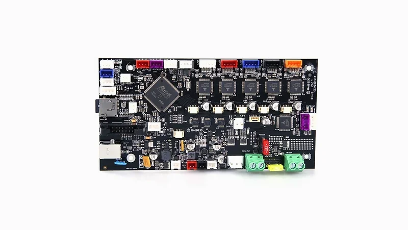 Raise3D E2 3D printer motherboard with Atmel chip and various connectors on a black PCB, components arranged neatly for functionality.