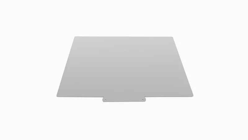 Raise3D E2 build plate, flat rectangular shape, designed for 3D printing, gray surface with mounting tab, essential component for print quality.