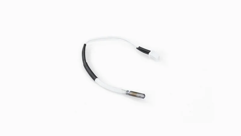 Raise3D E2 3D printer heater cartridge, black and white wire with connector on white background.