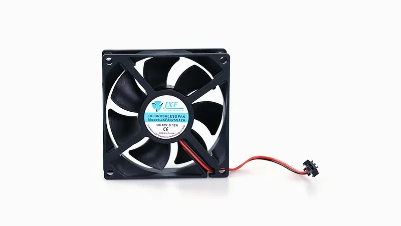 A black DC brushless fan with a label featuring JXF branding and model spec, likely used in a Raise3D E2 3D printer, with red and black wires attached.