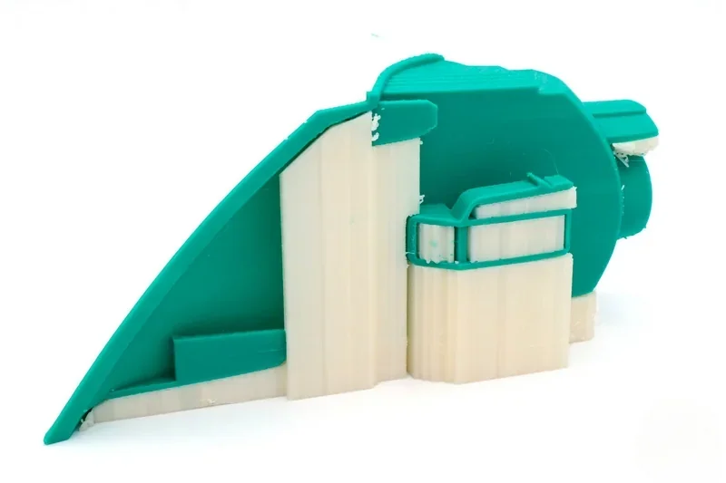 Green and white 3D-printed model showcasing complex geometry, created by Raise3D E2.