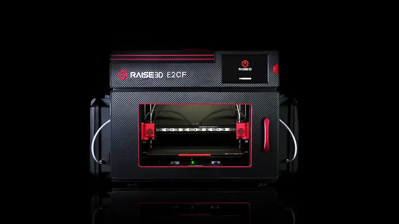 Raise3D E2CF 3D printer with carbon fiber texture, red accents, branding, and dual extruders, designed for high-performance printing.
