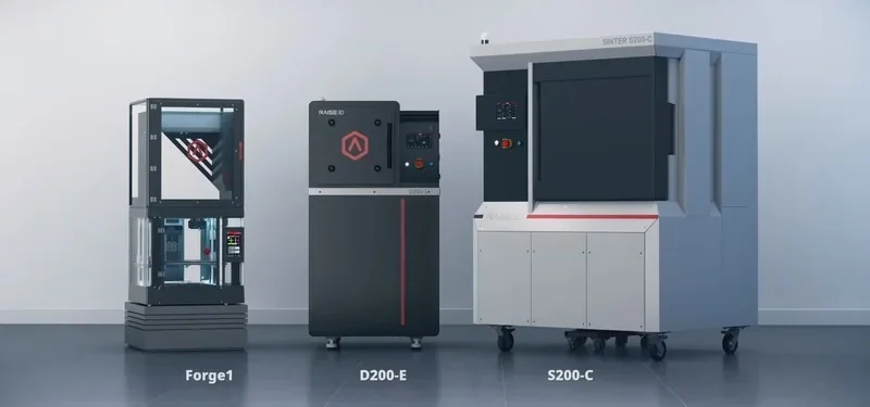 Raise3D MetalFuse system with Forge1, D200-E, and S200-C machines, featuring sleek designs against a neutral background.