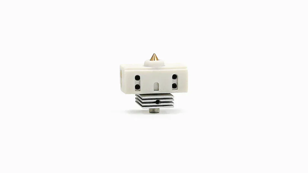 White 3D printer nozzle for Raise3D Pro2 Plus, featuring a brass tip and metallic heat sink against a plain background.