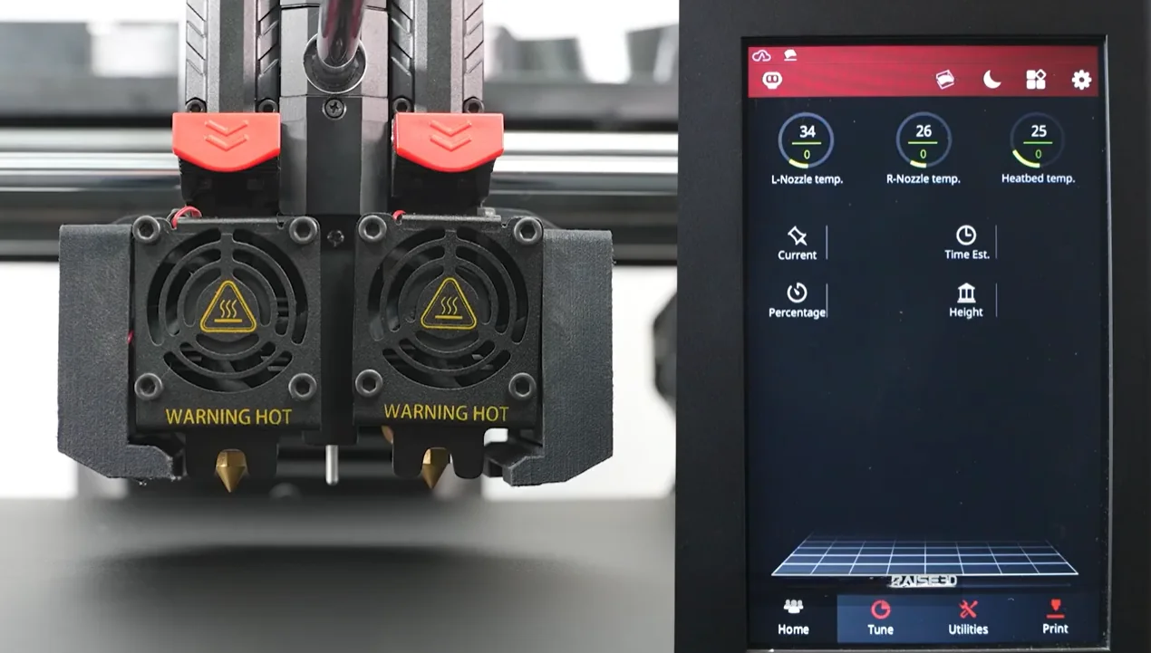 Raise3D Pro3 dual extruders with "Warning Hot" labels and touchscreen display showing nozzle and heatbed temperatures.