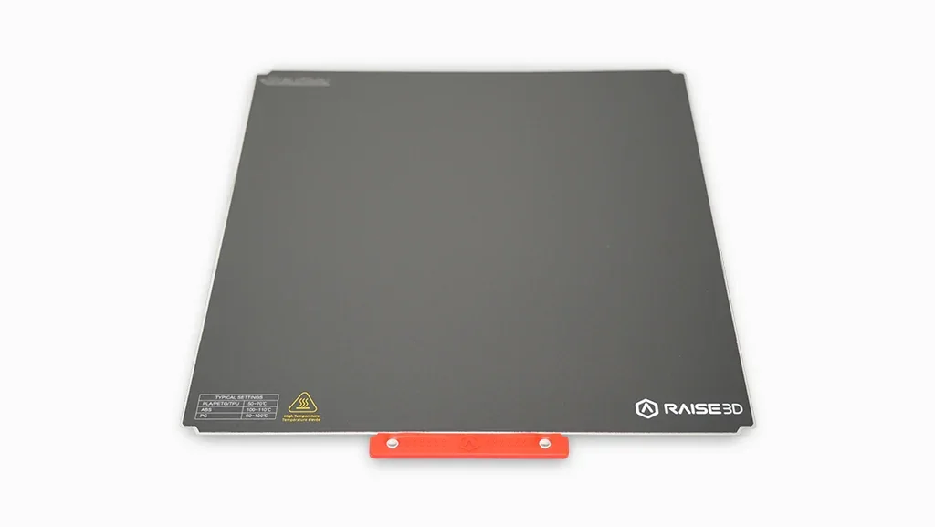 Raise3D Pro3 3D printer heated build plate, black with red handle, Raise3D branding, and temperature settings guide, designed for precise printing.