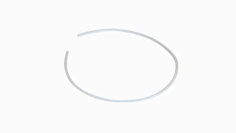 White 3D-printed filament guide loop created by Raise3D Pro3 on a plain background, highlighting smooth surface and precision.
