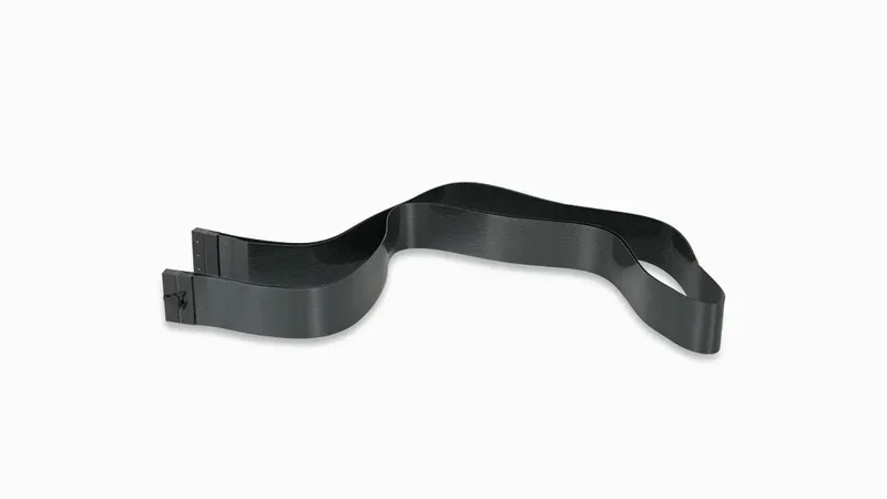 Curved black 3D-printed part created by the raise3d pro3, showcasing its smooth finish and precision capabilities.