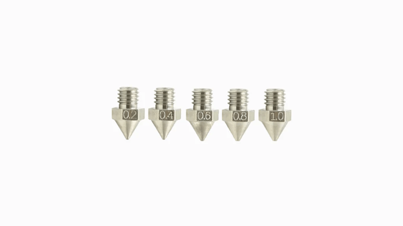 A set of five 3D printer nozzles displayed in a row, each made of metal with hexagonal bases. The nozzles have engraved sizes: 0.2, 0.4, 0.6, 0.8, and 1.0. These nozzles, compatible with the Raise3D Pro3 HS, are designed to offer various printing resolutions and material flow rates.