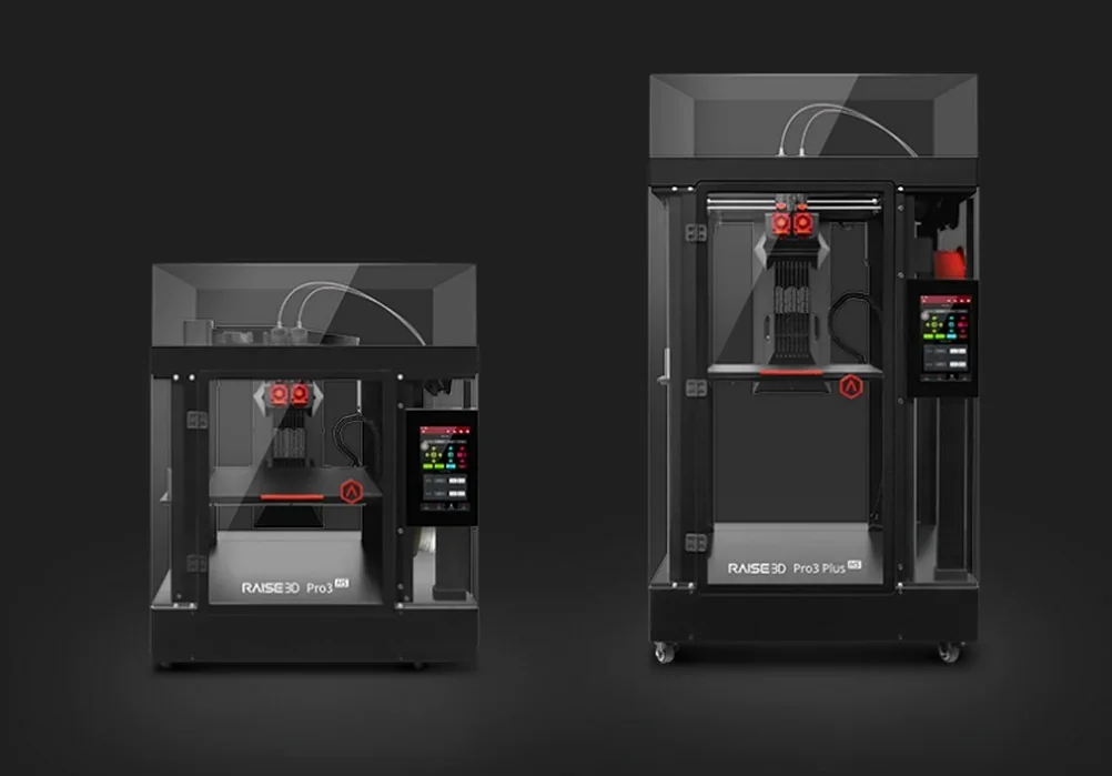 Raise3D Pro3 HS printers with touchscreen displays, showcasing dual-extruder systems against dark background.