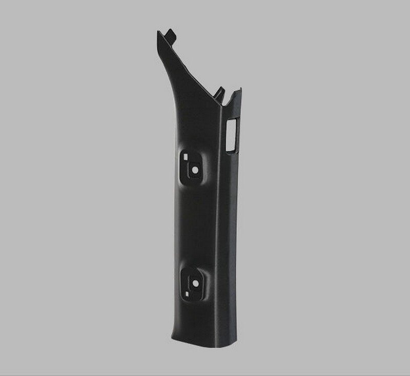A black, 3D-printed automotive part with a smooth finish, created by the Raise3D Pro3 HS printer. The part features multiple cutouts and mounting holes, designed to fit specific components. The item is set against a neutral gray background to emphasize its contours and precision detailing.