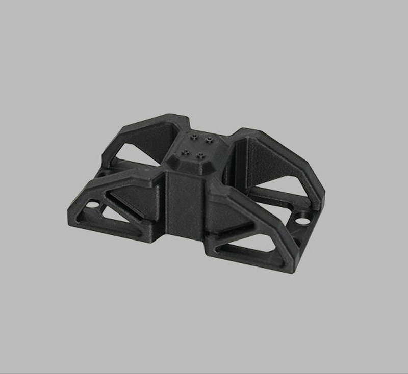 3. A complex black 3D-printed component created by the Raise3D Pro3 Plus HS. The object features multiple intersecting beams forming a symmetric frame with strategic holes for mounting. Its matte finish and intricate design demonstrate the printer's precision and capability in producing functional parts.