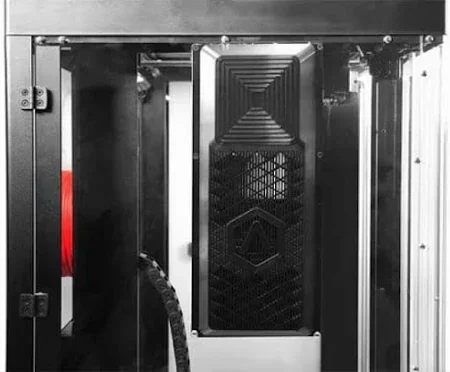 The image displays the dual-extruder system of the Raise3D Pro3 Plus HS 3D printer. The extruders are mounted side by side, featuring precision machining with visible nozzles positioned underneath. The extruders are supported by a robust, metallic rail system for stability and precision during printing. Red warning labels indicate thermal caution zones, emphasizing the high-temperature operation capability of the printer.