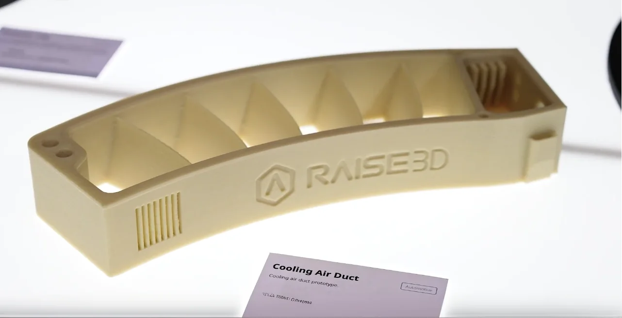 3D-printed cooling air duct prototype with Raise3D branding, created by raise3d rmf500, displayed with product information card.