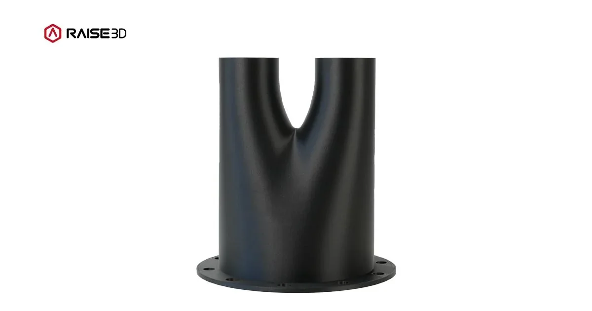 Black 3D-printed part from raise3d rmf500 with curved design and flanged base, featuring Raise3D logo on a white background.