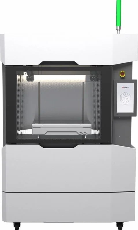 Raise3D RMF500 3D printer with sleek design, enclosed build chamber, touchscreen interface, featuring sample parts created by the RMF500.