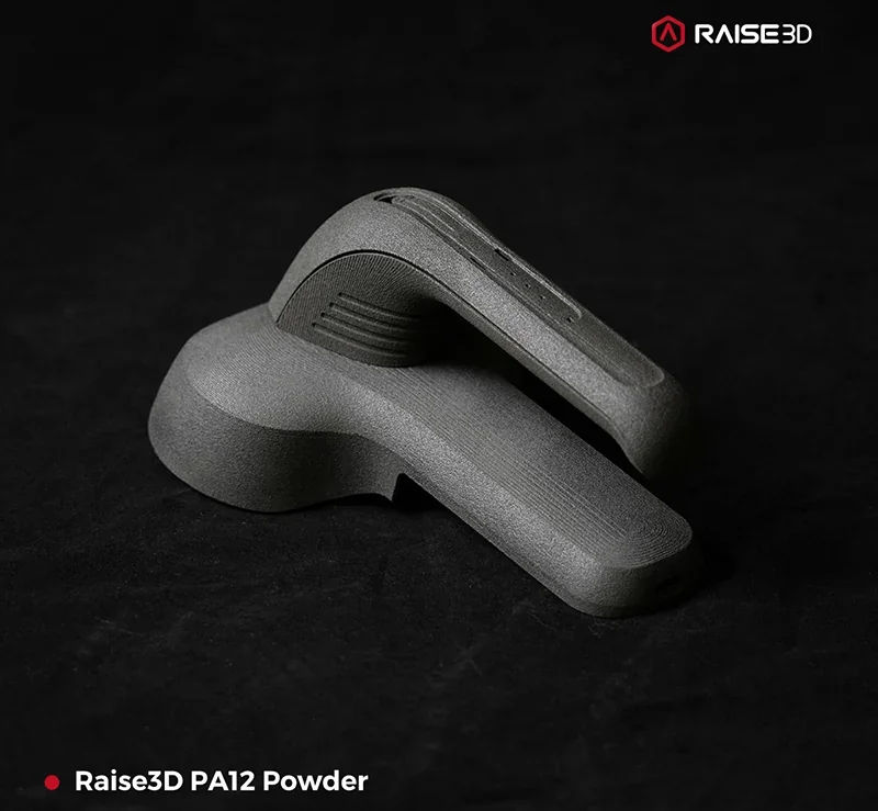 Raise3D RMS220 3D printed component on black background, showcasing precise lines and texture, created using Raise3D PA12 Powder.