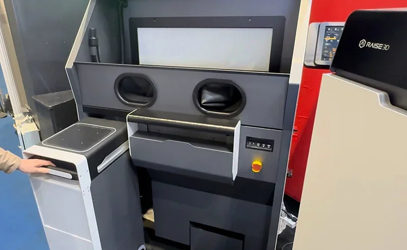 Raise3D RMS220 3D printer setup in a tech environment, showcasing control panel and components. Samples/parts created by Raise3D RMS220.