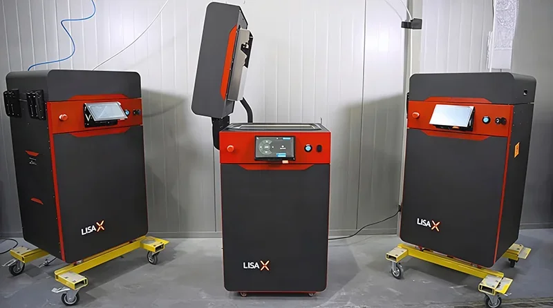 Three Sinterit Lisa X 3D printers in a workshop setting, featuring control panels and sleek black-red design, with parts made by these printers.