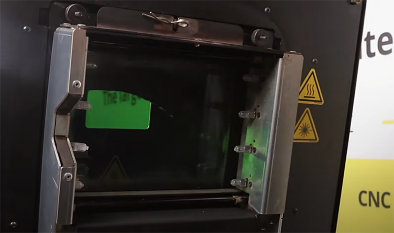 Sinterit Lisa X 3D printer chamber with warning symbols.