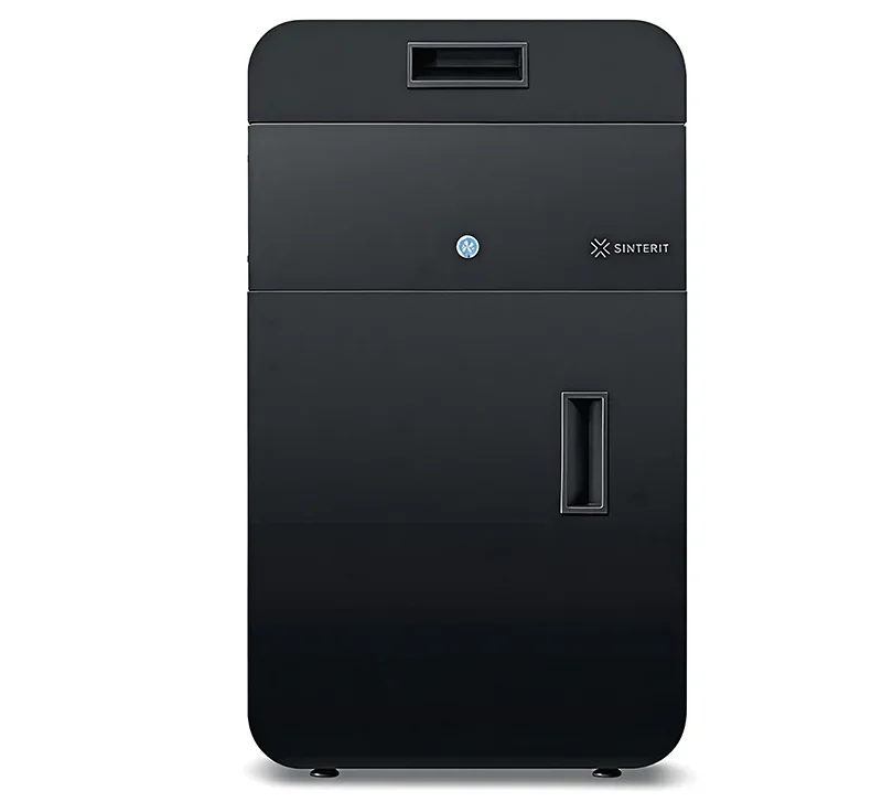 Sinterit Lisa X 3D printer in black, featuring a sleek, rectangular design with Sinterit branding, a handle, and control panel, showing functionality.
