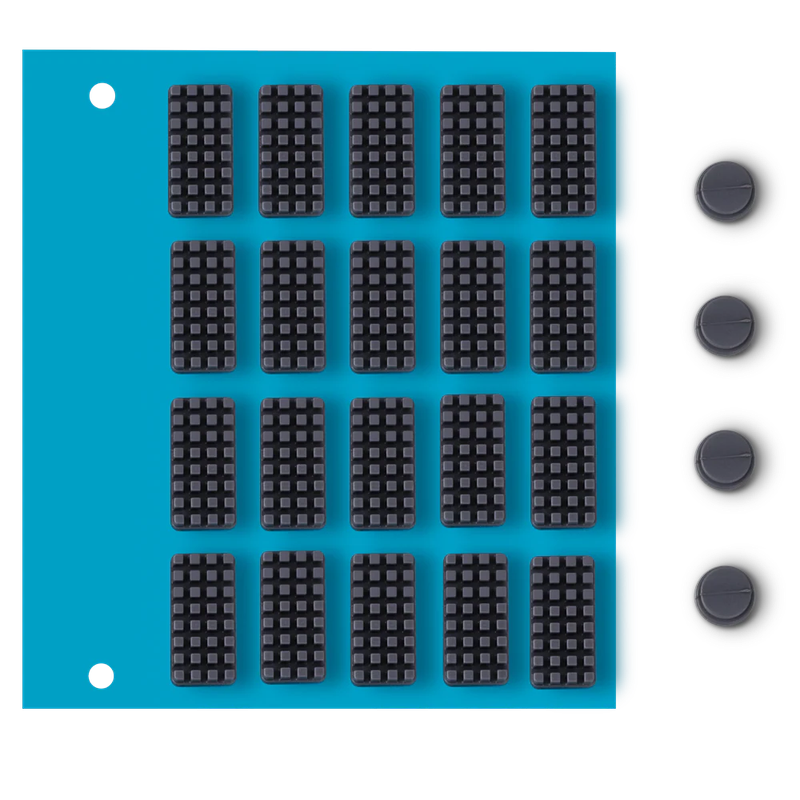 Snapmaker U1 showcases a blue grid with black 3D-printed textured samples and round parts, demonstrating precise printing capabilities.