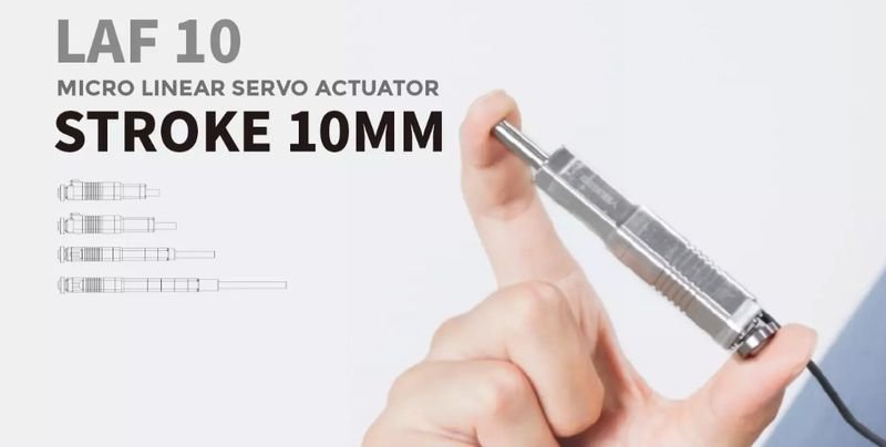 The image showcases the LAF 10 micro linear servo actuator with a stroke length of 10mm. The actuator is held between fingertips for scale, emphasizing its compact size and precision. The design appears sleek and metallic, likely indicative of durable material. The graphical representation on the left provides a visual reference of its mechanics and possible applications in robotics and other precision-required fields.