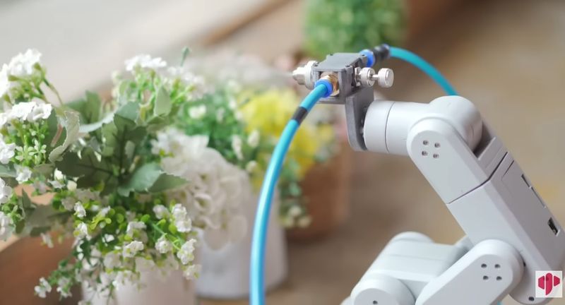 a can take care of the flowers on the Elephant Robotics mechArm 270 M5Stack